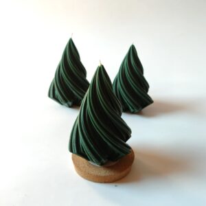 Green spiral tree candle with tapered sculptural design
